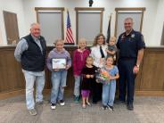 Annie Westover and Family with Mayor Olson and Fire Chief Lind